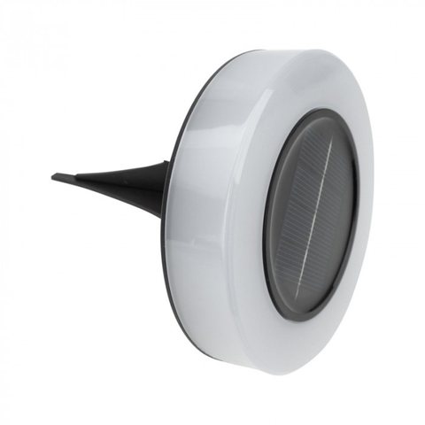 Lampa solarna SLO-1 w ujęciu na ukos: biały klosz na czarnej podstawie, w środku widoczny okrągły panel słoneczny